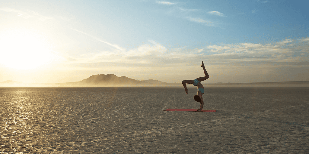 Yoga A woman doing Yoga in the desert