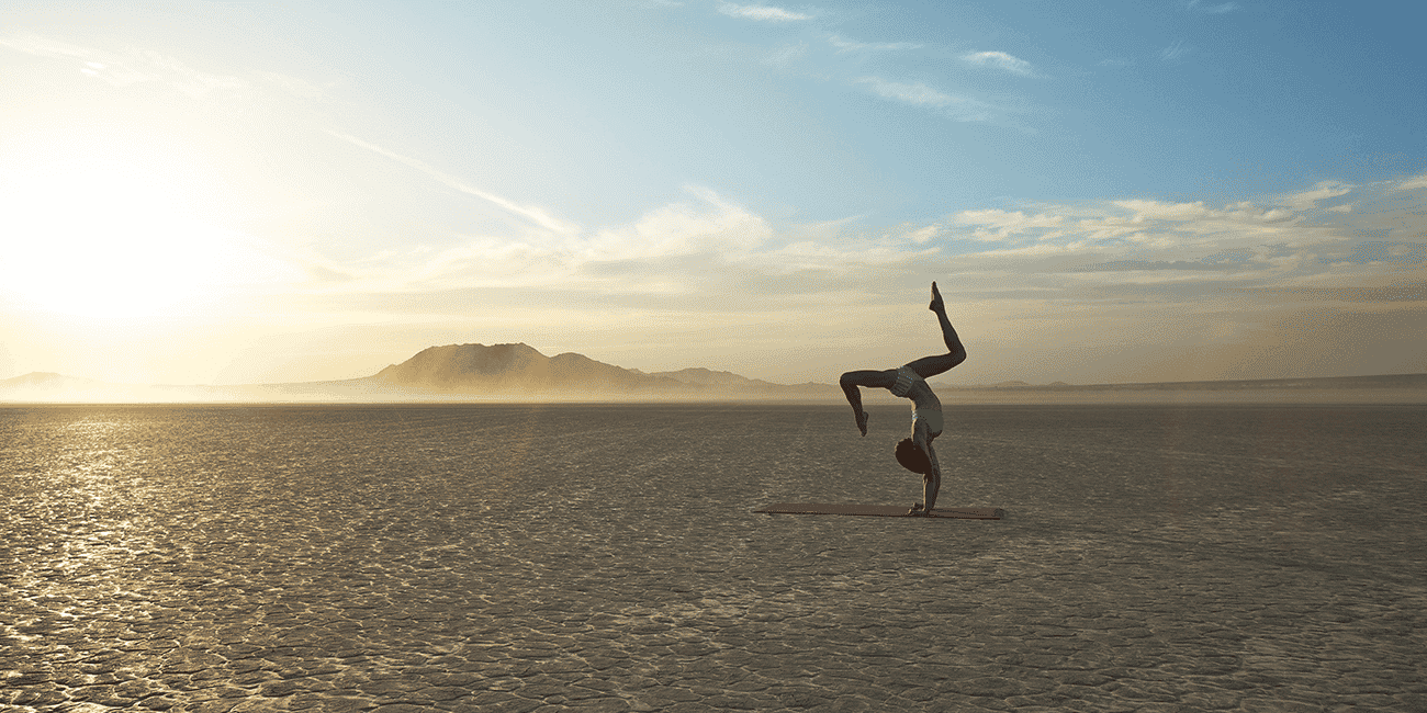 Yoga A woman doing Yoga in the desert
